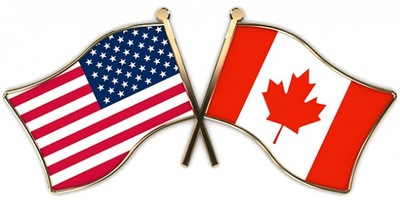 Us And Canadian Flag Feature Image 580x333